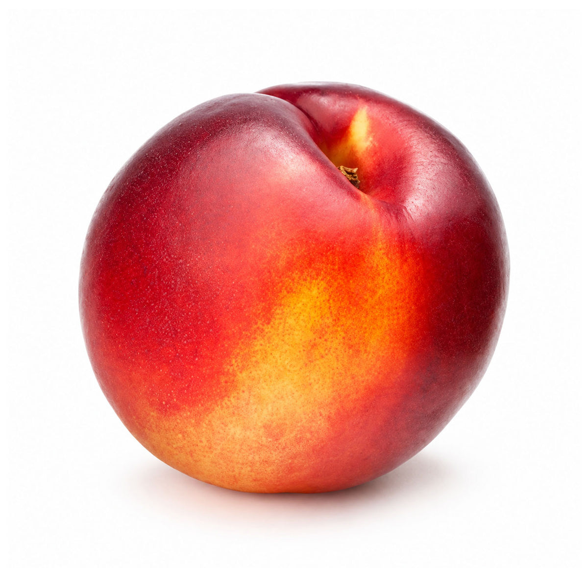 A ripe nectarine with red and golden skin